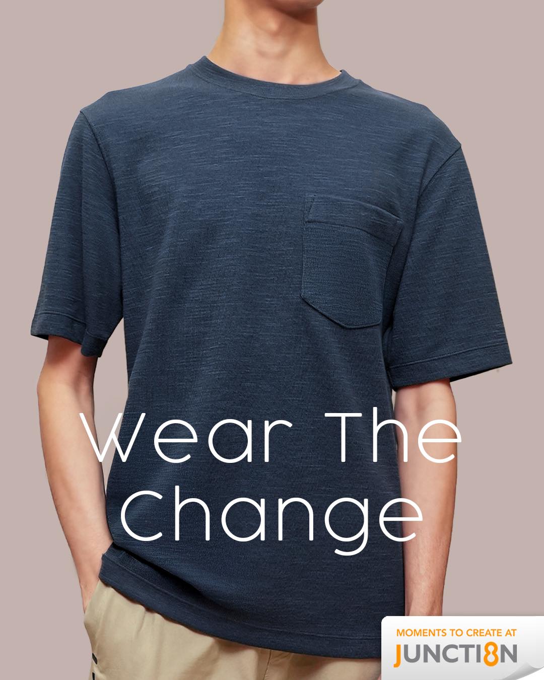A man wearing the Under Armour UA Meridian Men’s Pocket T-Shirt in Anthracite, showcasing its comfortable fit and pocket detail.