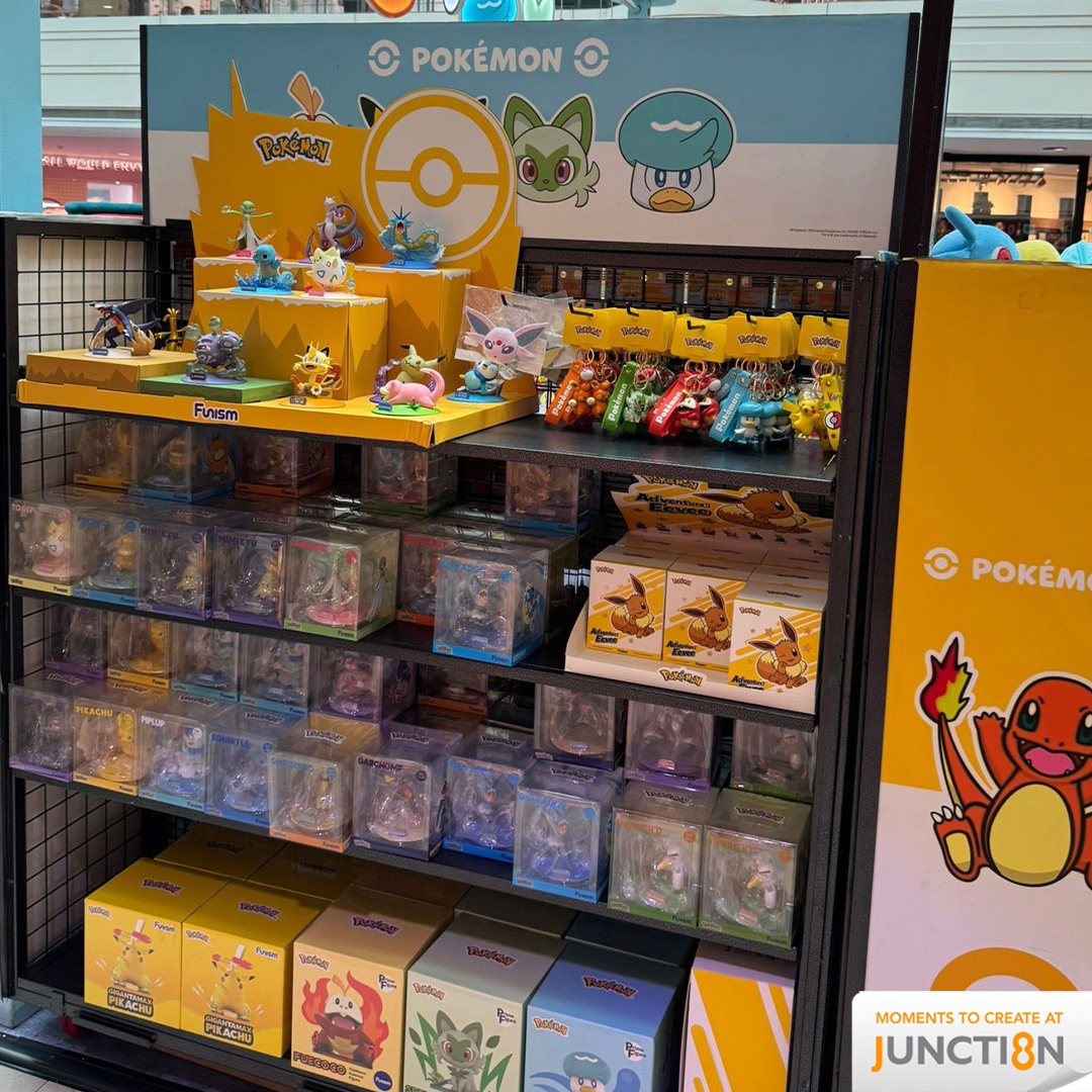 A vibrant display of Pokémon merchandise at the pop-up event.