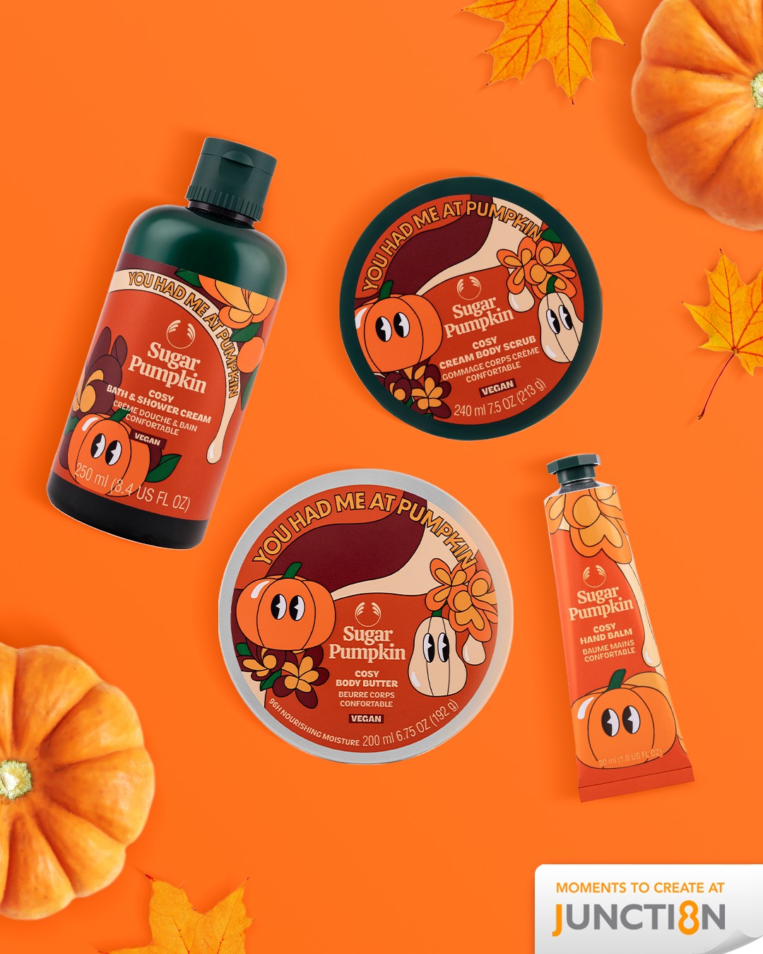 A selection of The Body Shop's Sugar Pumpkin Collection products, including body butter, shower cream, and hand balm.