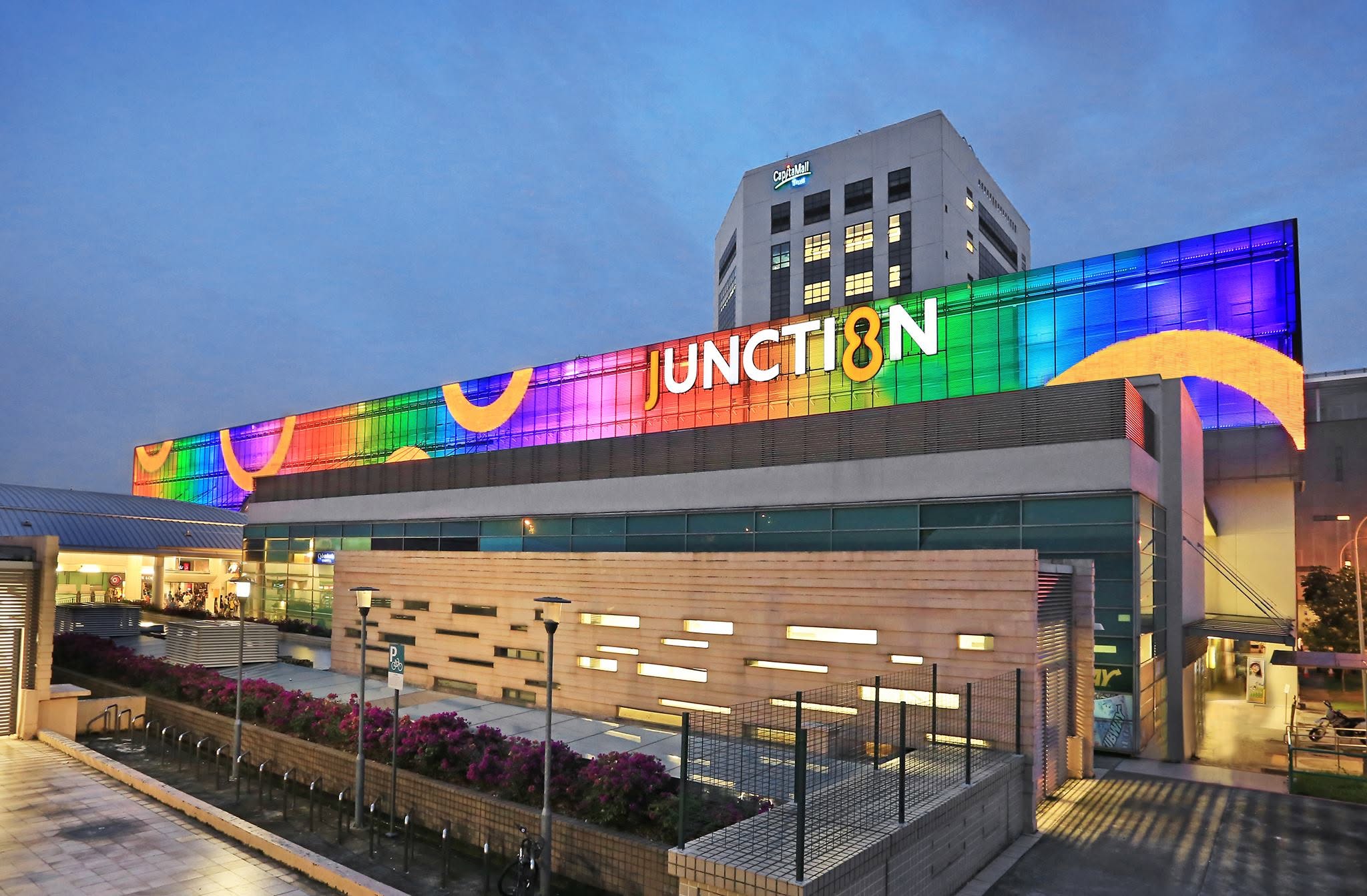 Junction 8 mall exterior at dusk