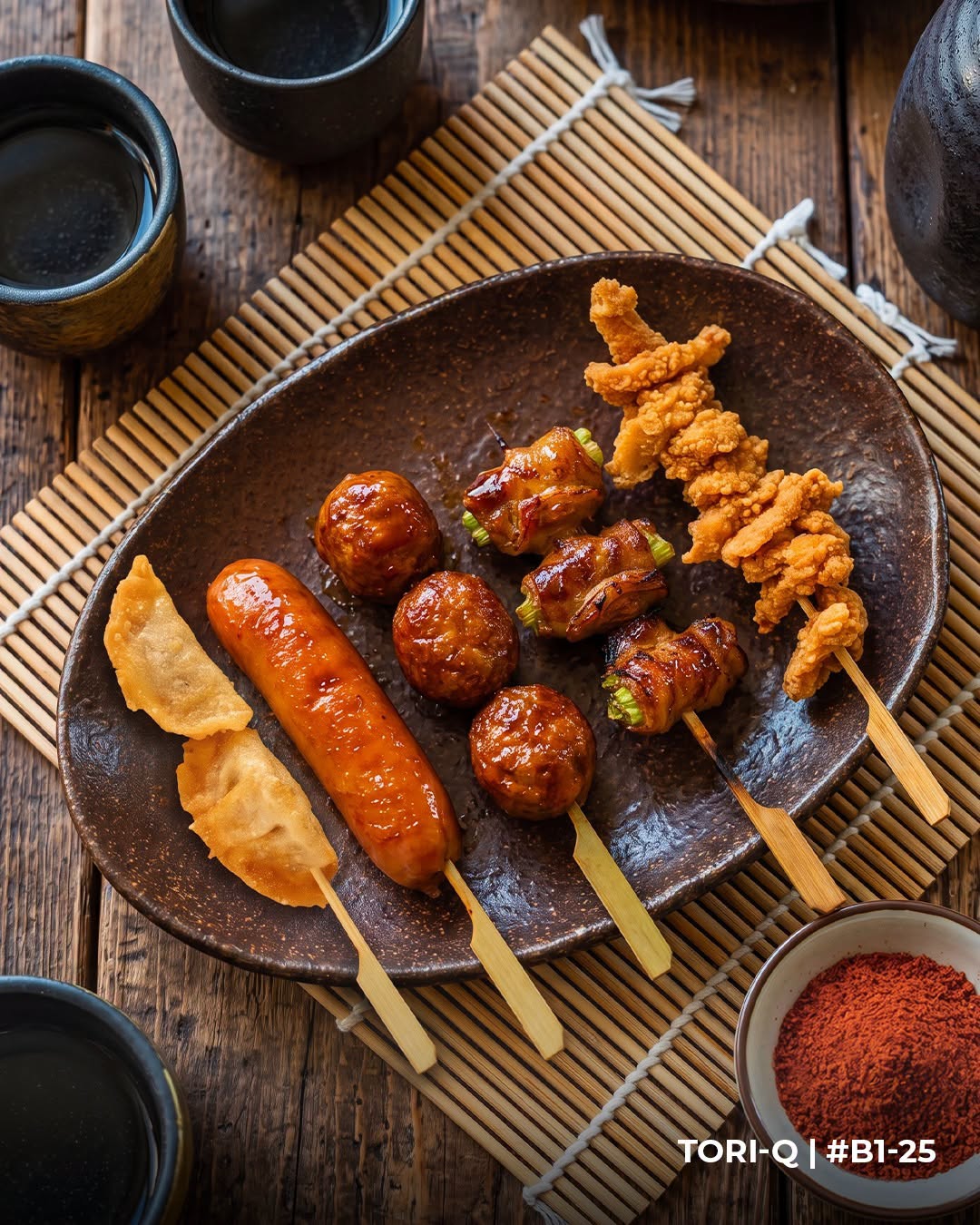 Tori-Q assorted yakitori skewers on a ceramic plate