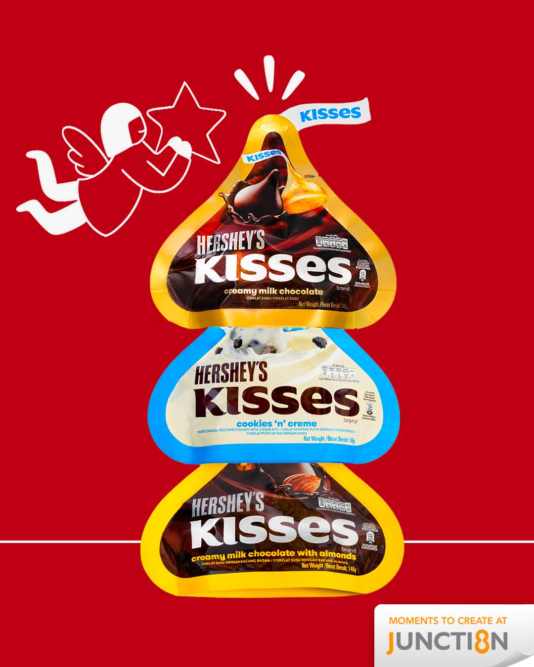 A festive display of Hershey's Kisses chocolates, arranged to resemble a small 'Kiss-mas' tree.