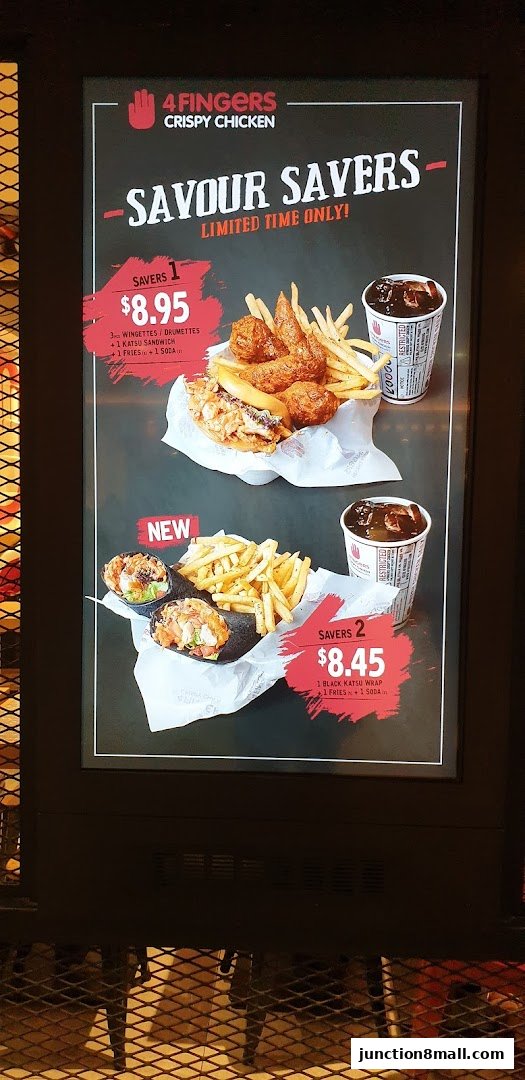 A menu board showcasing two limited-time 'Savour Savers' meal deals from 4 Fingers Crispy Chicken.