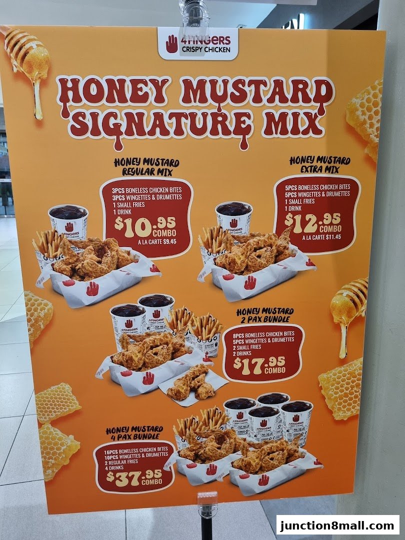 A promotional sign for 4 Fingers Crispy Chicken's Honey Mustard Signature Mix combos.