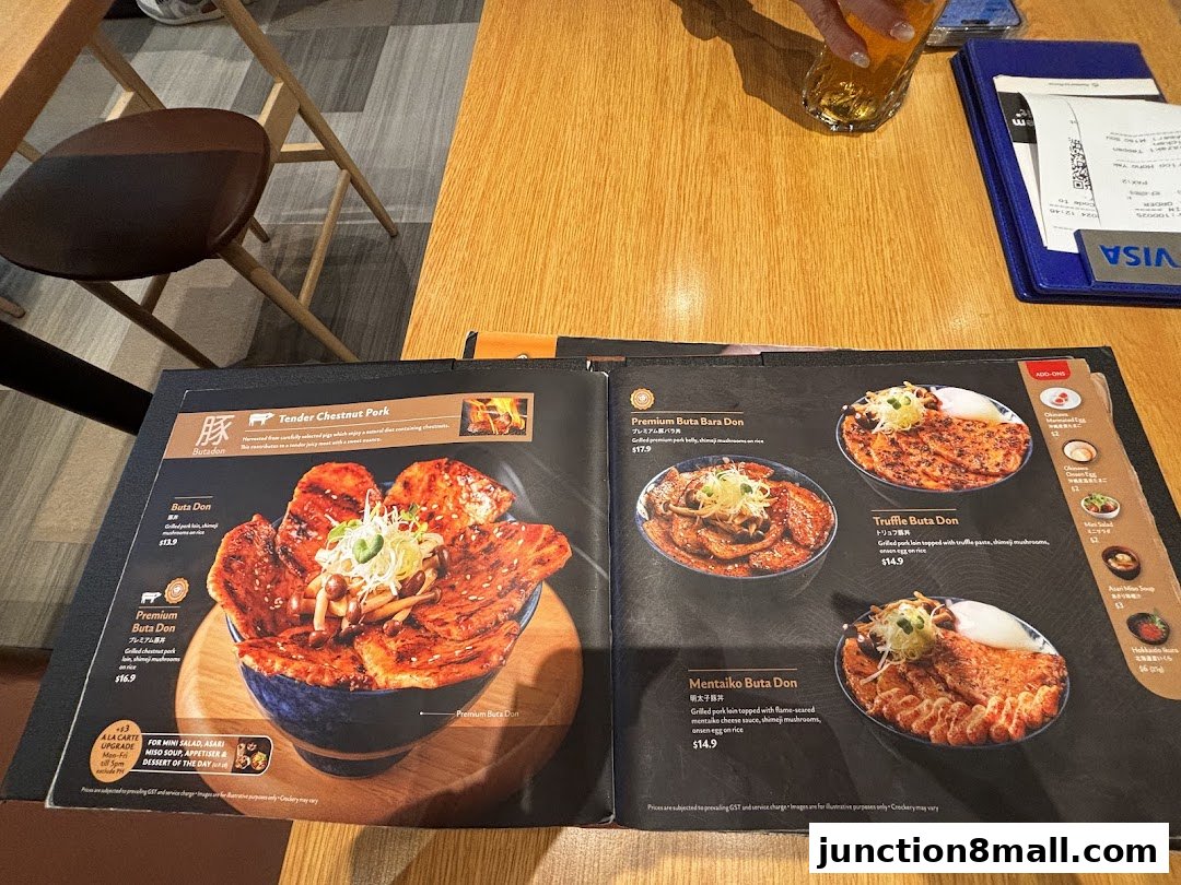 A menu from Aburi-EN featuring various pork donburi dishes with appetizing photos.