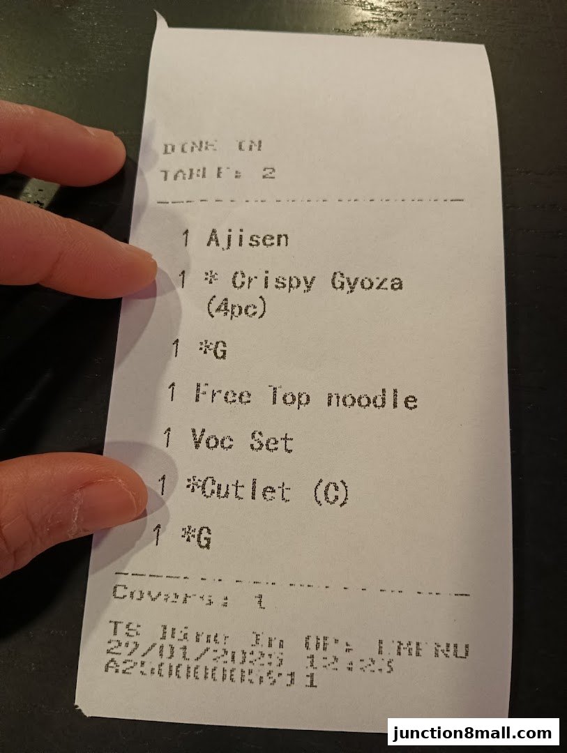 A receipt from Ajisen Ramen showing food items ordered and transaction details.