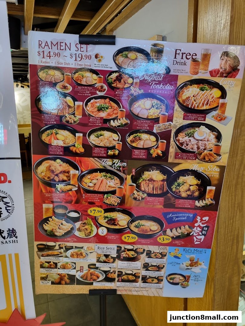 A menu board displaying various ramen sets, rice sets, and kid's meals with prices.