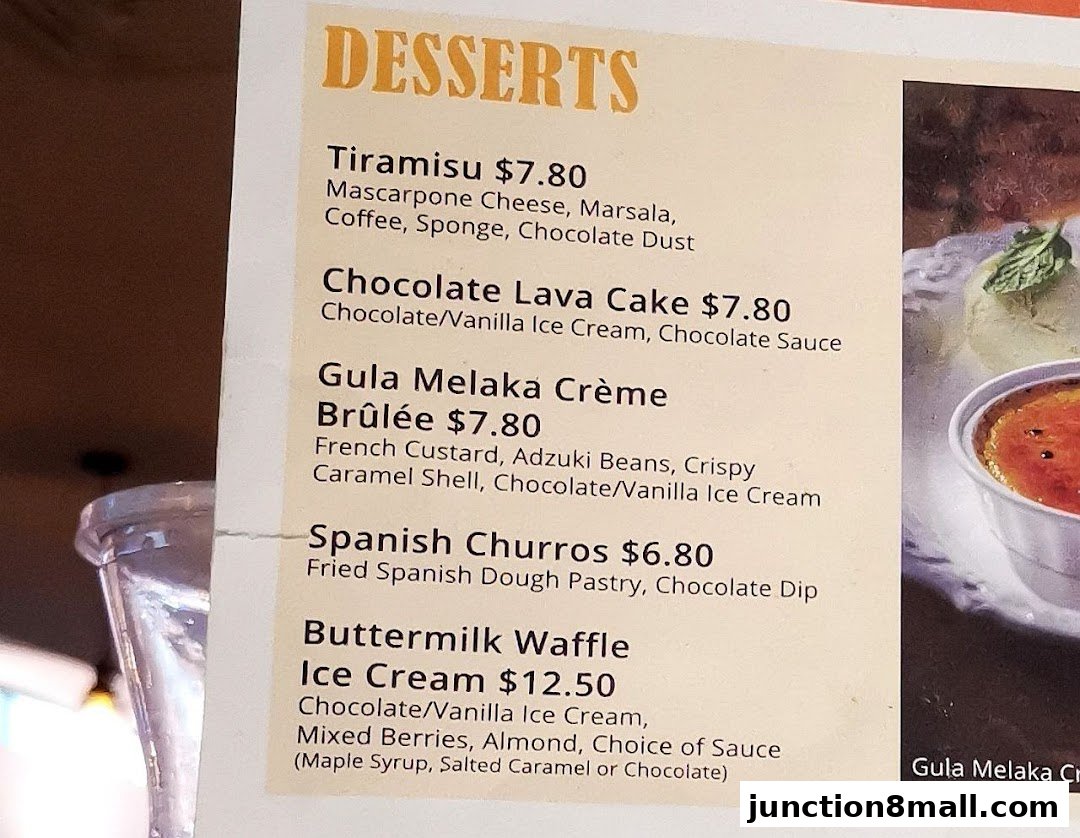 A menu featuring various desserts like Tiramisu, Lava Cake, Churros, and Waffles.