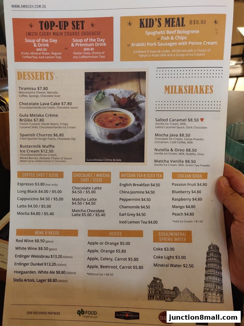 A menu from Ambush featuring desserts, milkshakes, coffee, tea, juices, and drinks with prices.