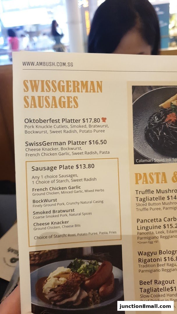 A menu featuring Swiss German sausages and pasta dishes with prices and descriptions.