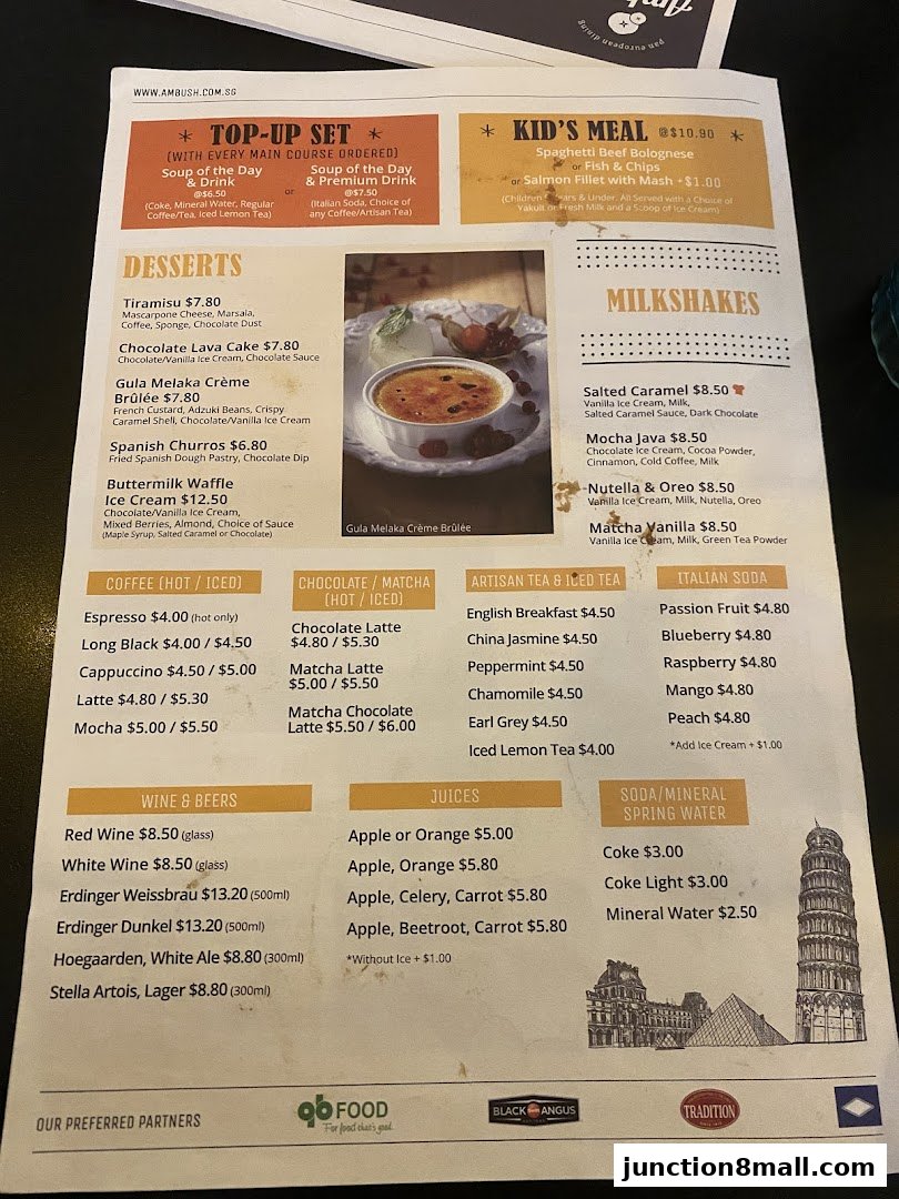 A menu from Ambush restaurant featuring desserts, milkshakes, coffee, tea, juices, and alcoholic beverages.