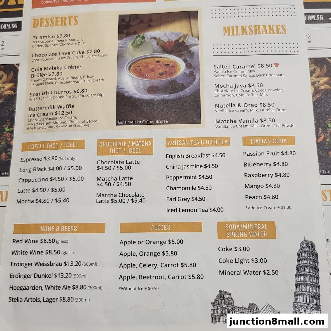 A menu featuring desserts, milkshakes, coffees, teas, juices, wines, and sodas.