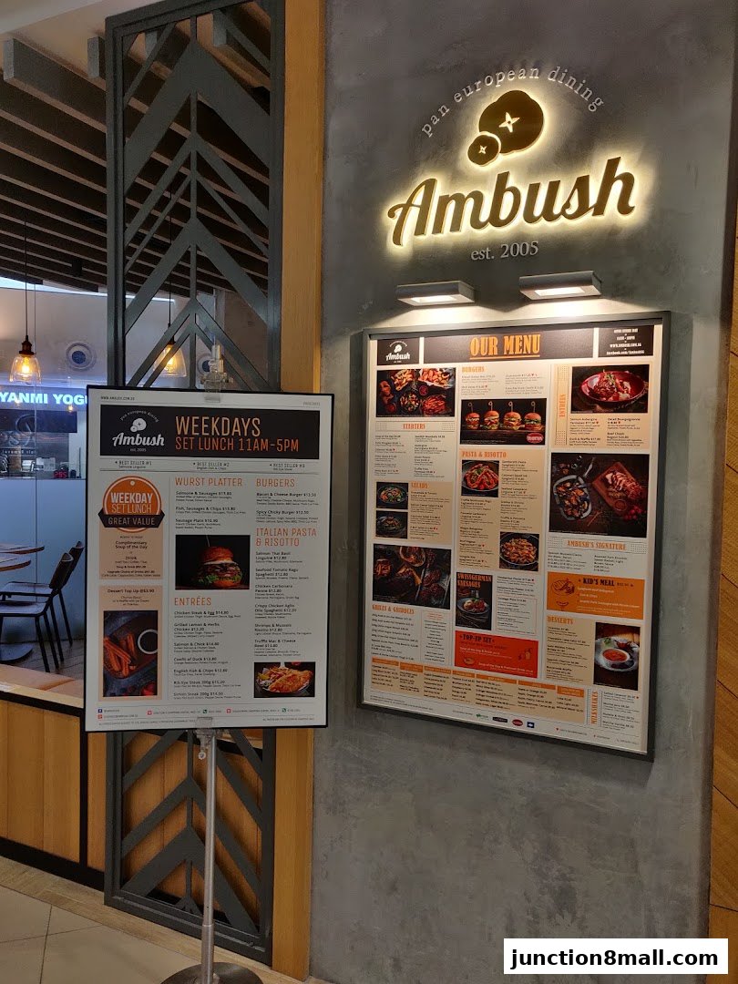 A menu board for Ambush restaurant, featuring pan-European dining options and set lunches.