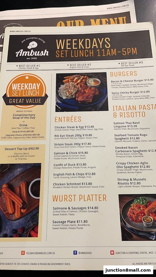 A menu from Ambush restaurant featuring weekday set lunches, burgers, pasta, and wurst platters.