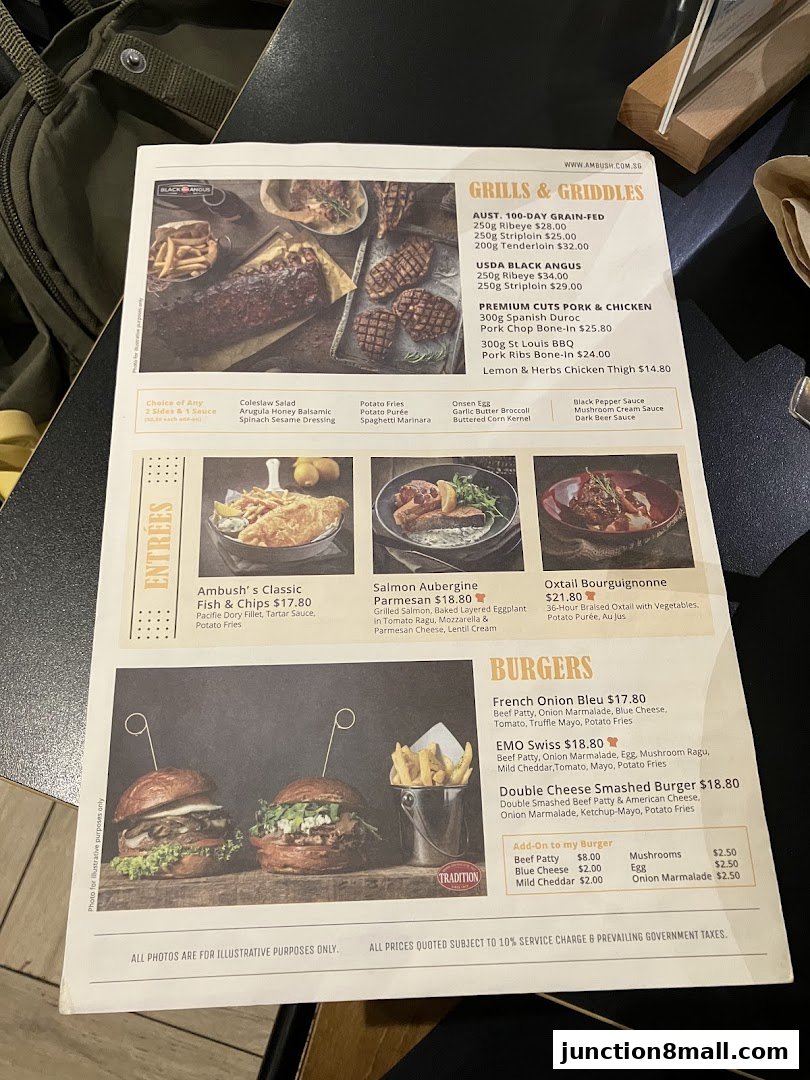 A menu from Ambush featuring grills, entrees, and burgers with prices and descriptions.