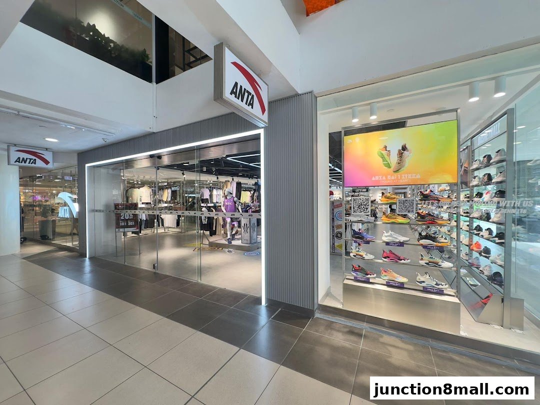 The exterior of an ANTA sports apparel and footwear store, showcasing shoes and clothing.