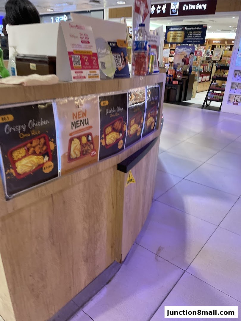 A counter display for BBQ Express showing menu items and promotions.
