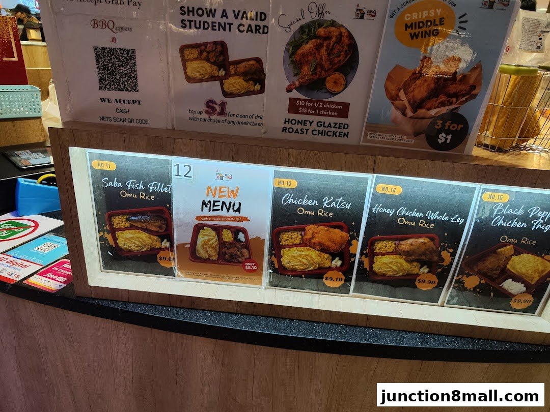 A display of various Omu Rice meals and special offers from BBQ Express.