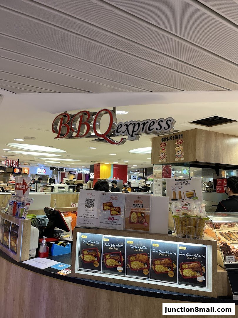 The front counter of BBQ Express with menu displays and a prominent sign.