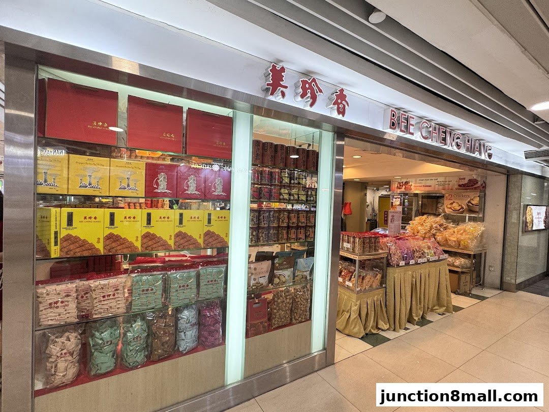 Bee Cheng Hiang shop front displaying various packaged snacks and gift boxes.