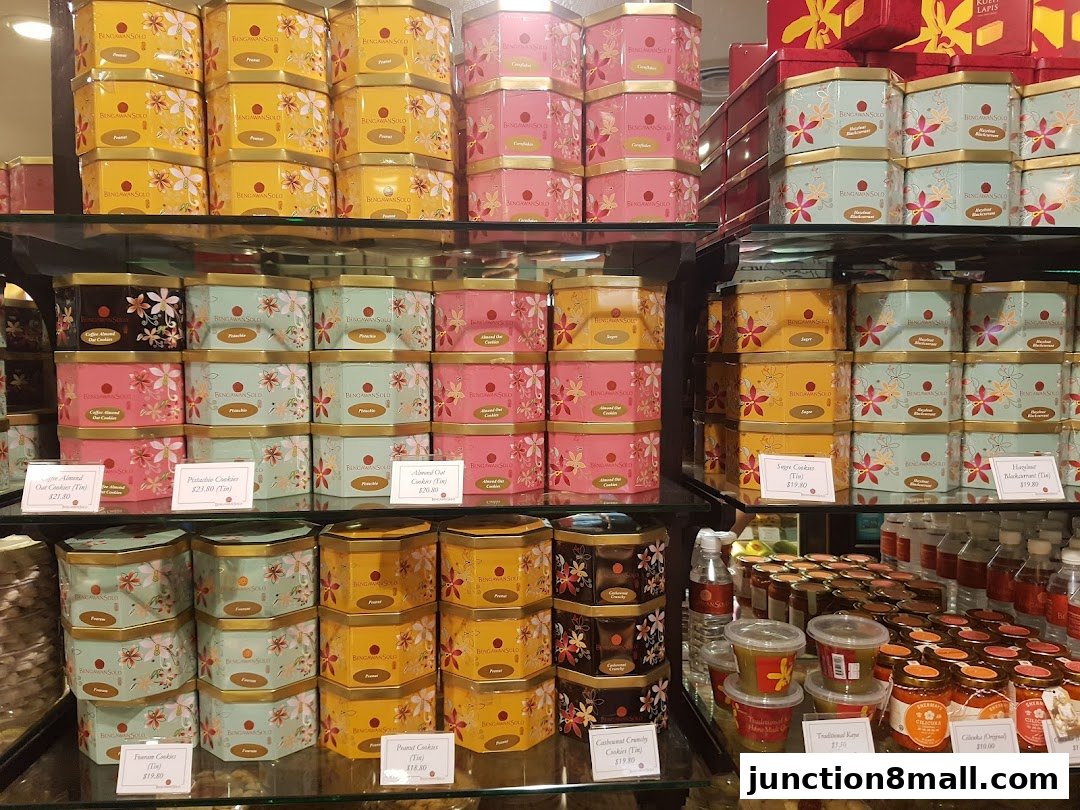 Shelves filled with decorative tins of cookies and other treats from Bengawan Solo.