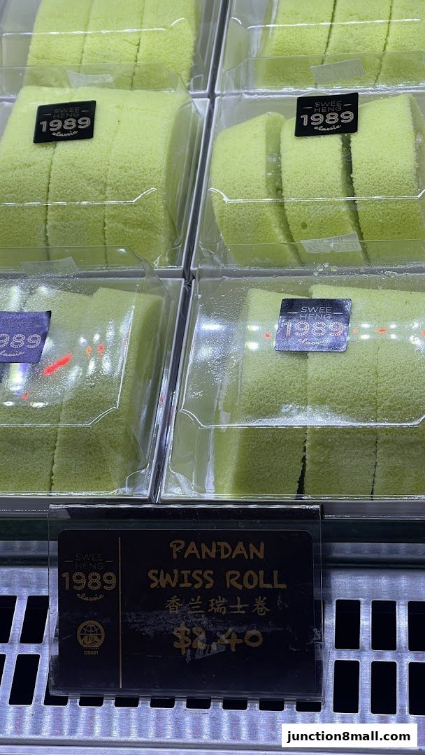 Close-up of Pandan Swiss Rolls displayed in clear plastic packaging.