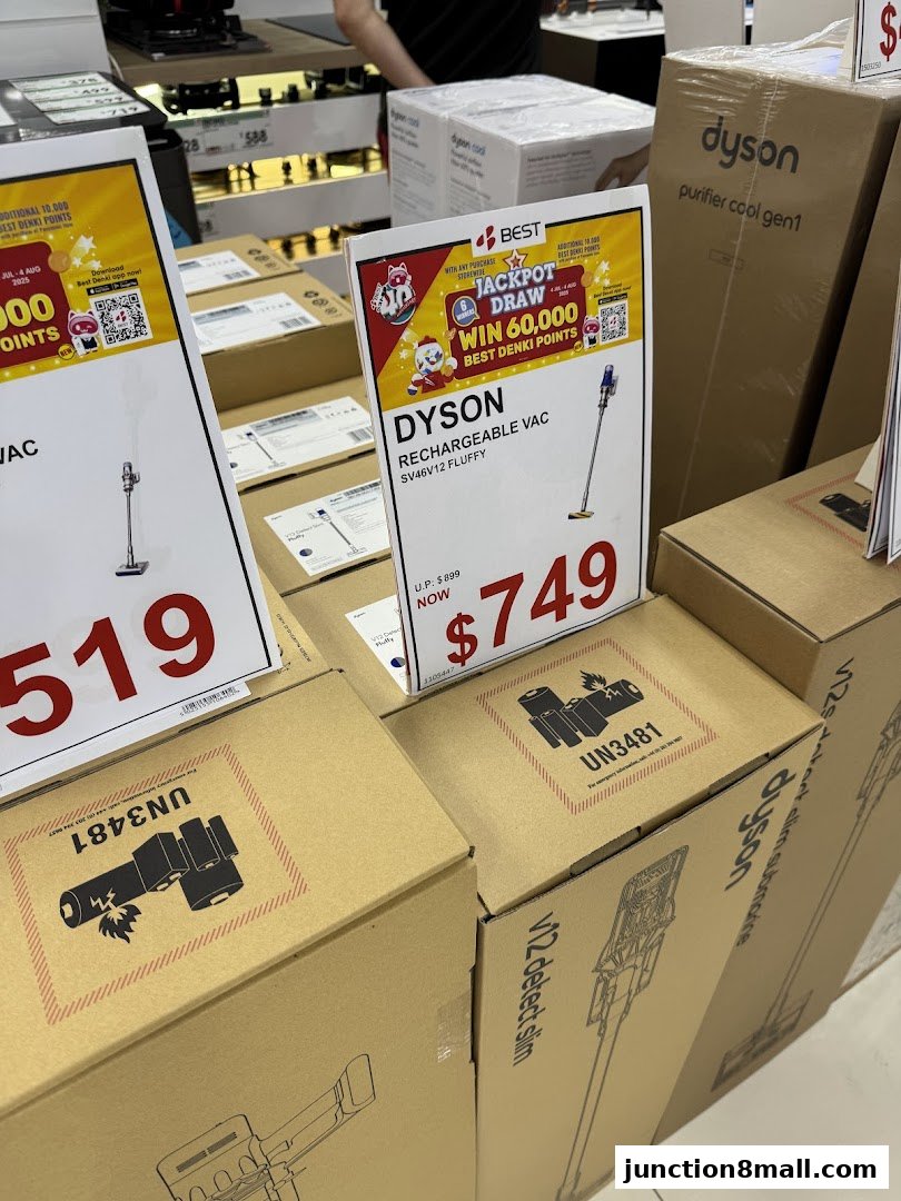 Promotional display of Dyson vacuum cleaners and air purifiers at Best Denki.