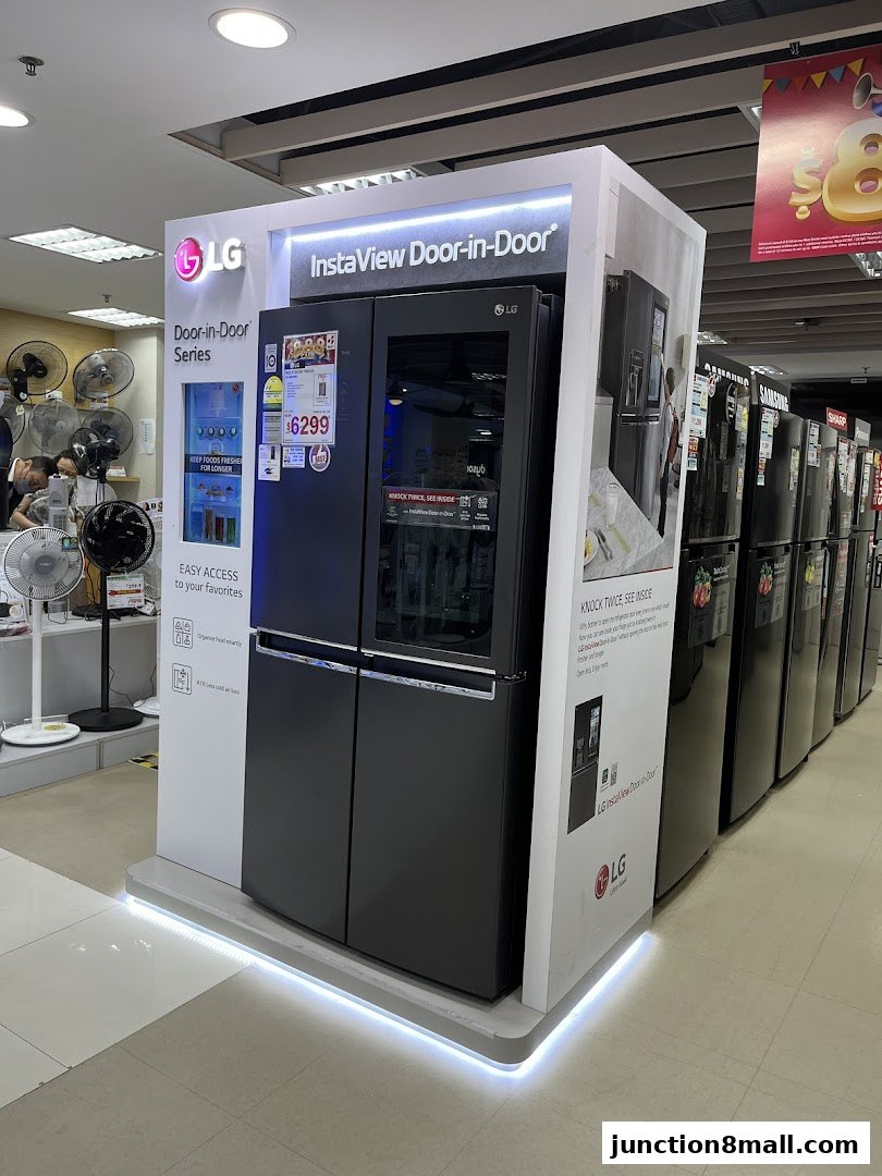 LG InstaView Door-in-Door refrigerator display with price tag and product information.