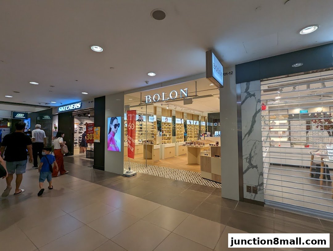 The Bolon Eyewear shop front displays a wide selection of sunglasses and optical frames.