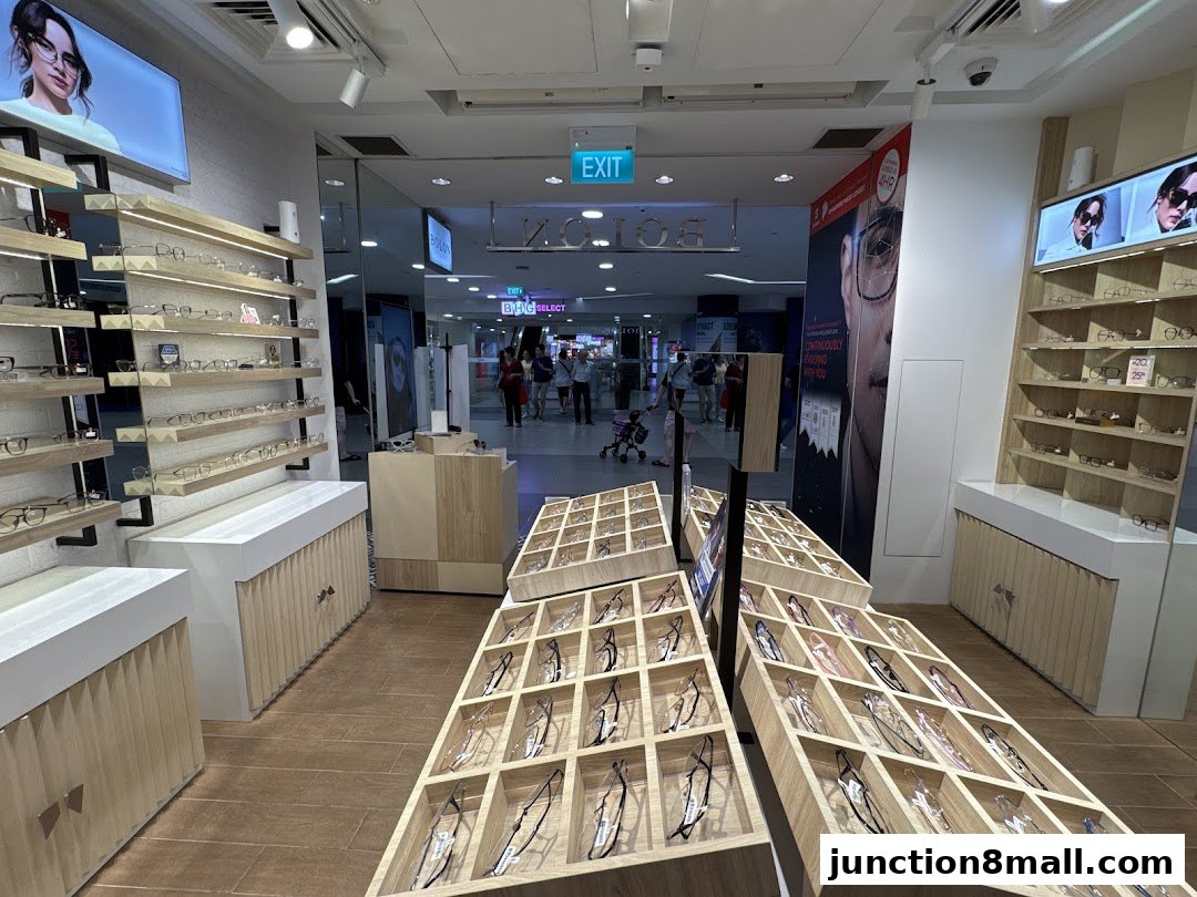 Interior view of Bolon Eyewear shop showcasing various eyeglasses on display shelves and stands.