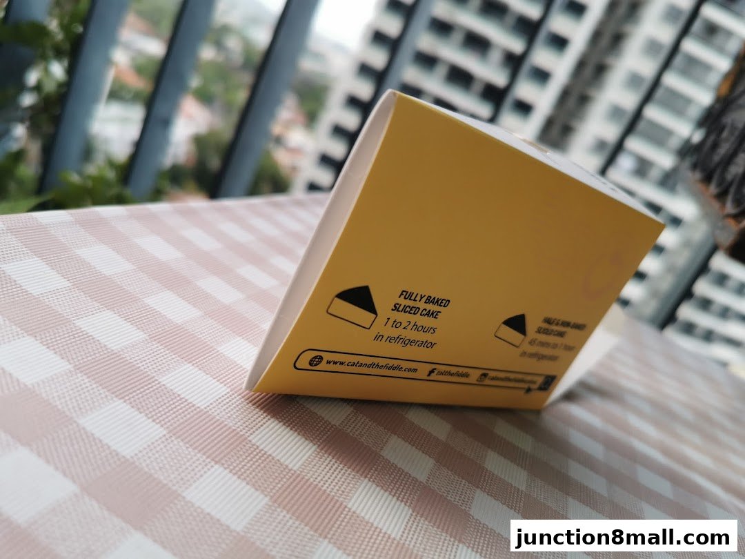 A yellow cake box with baking instructions and website information.