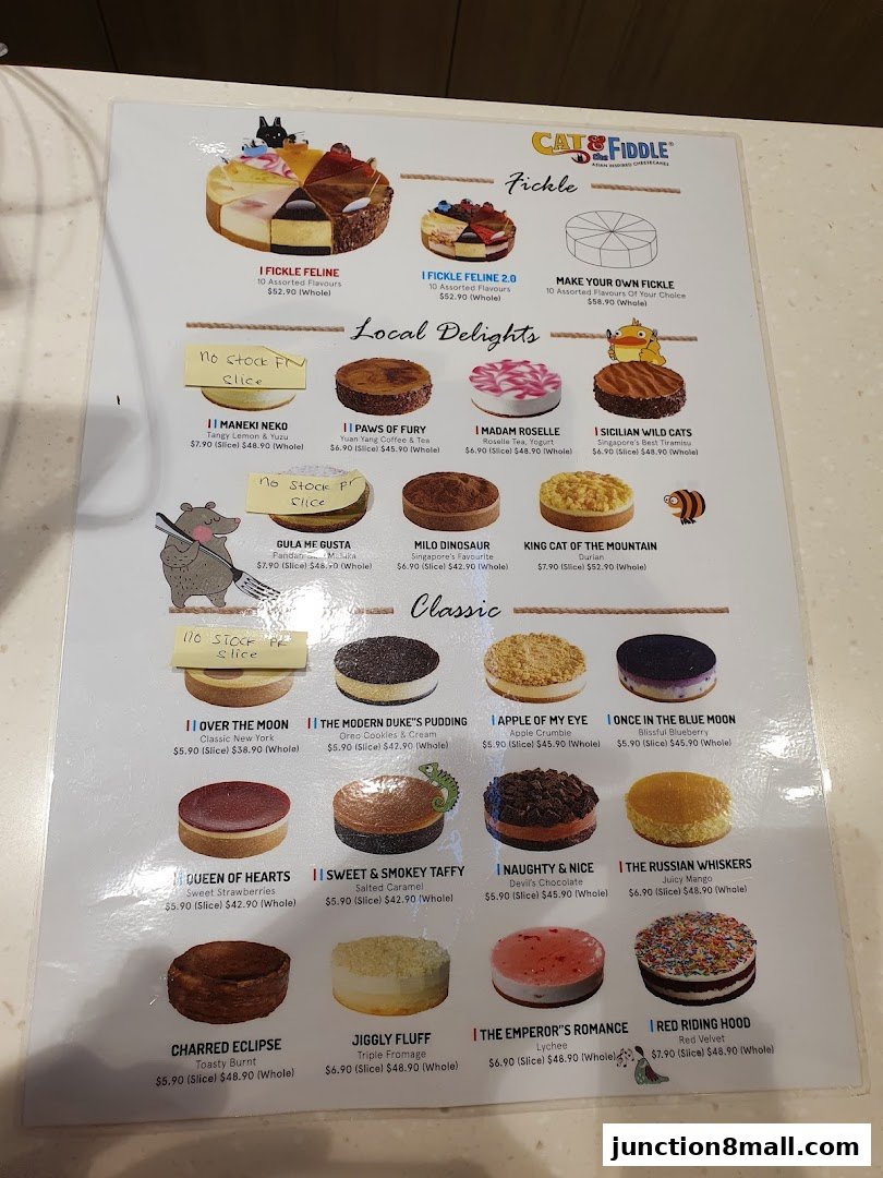 A menu showcasing a variety of cheesecakes with colorful images and descriptions.