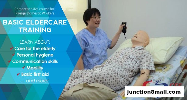 A training session for basic eldercare, showing a nurse with a mannequin.