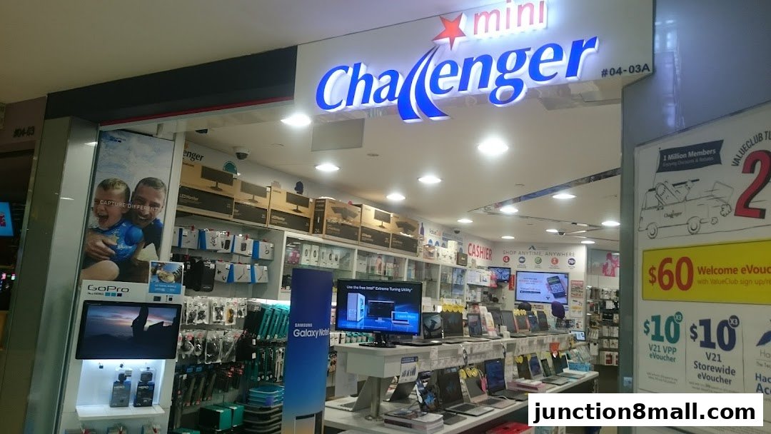 The exterior of a Challenger electronics store showcasing various gadgets and promotions.