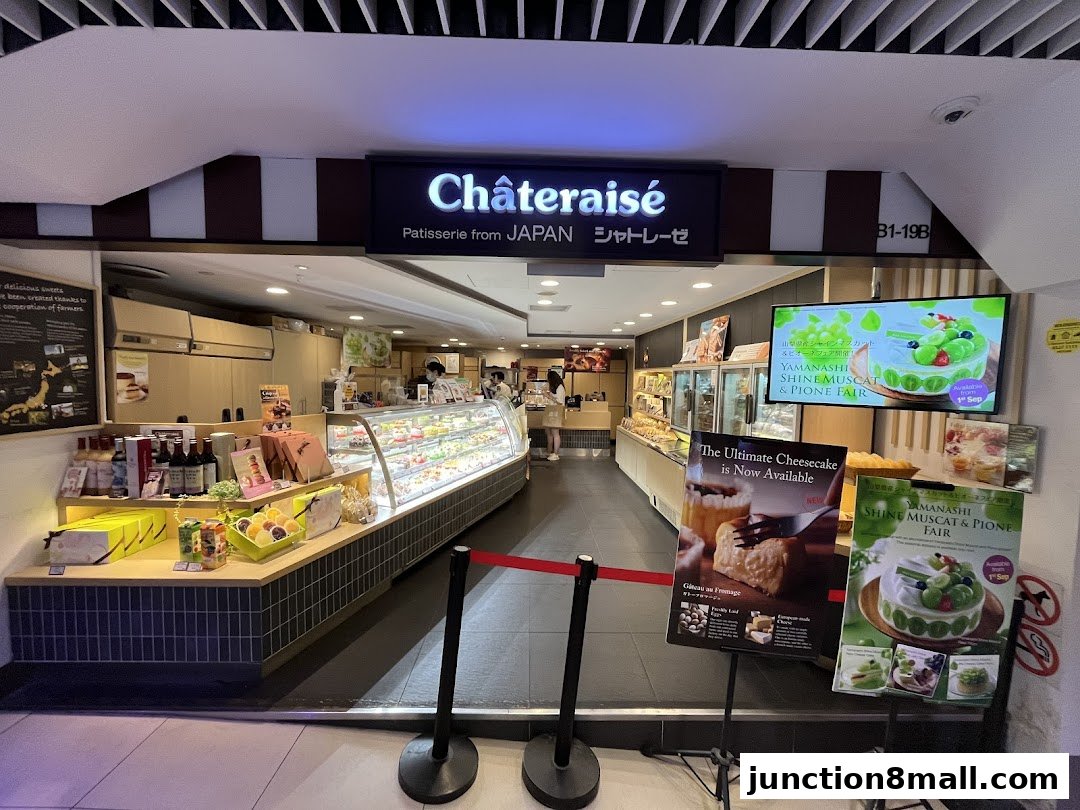 Châteraisé patisserie shop interior with display cases full of cakes and pastries.