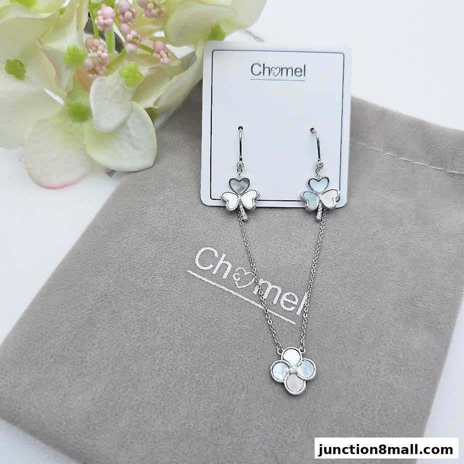 A delicate clover-shaped necklace and earrings set from Chomel.