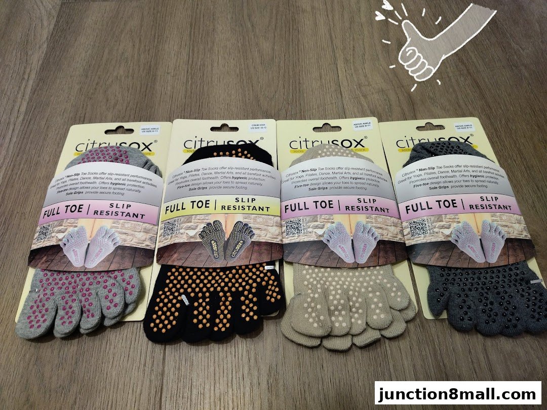 Four pairs of Citrusox full toe, slip-resistant socks with grippy soles are displayed.
