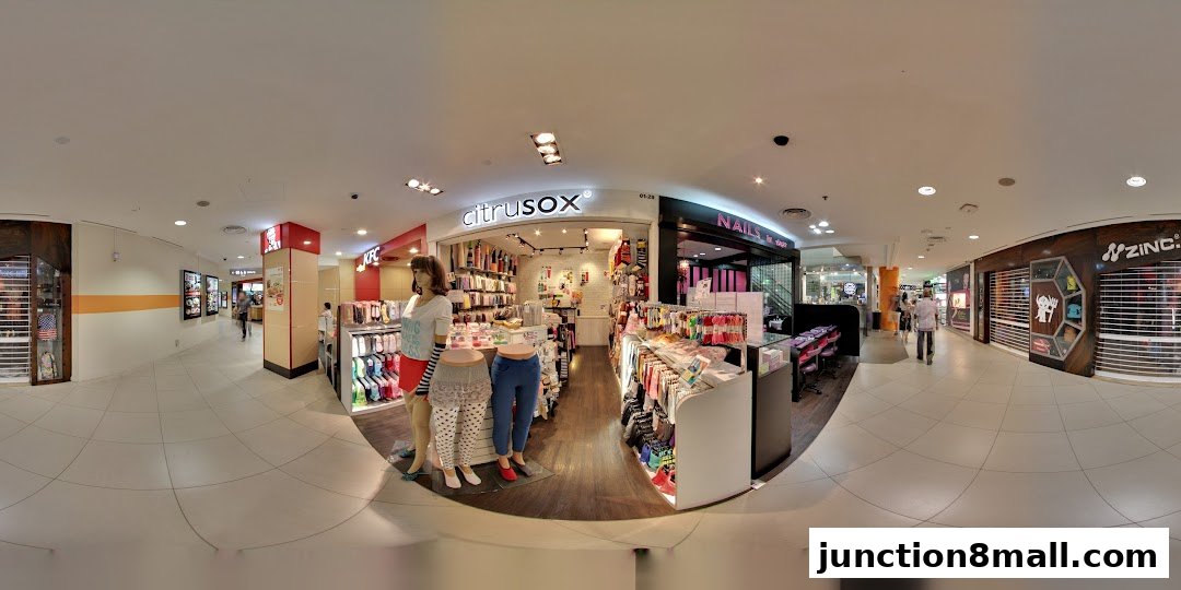 A wide view of the Citrusox store entrance, showcasing colorful socks and apparel on display.