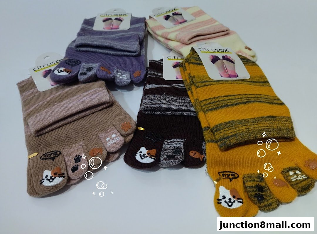 A collection of colorful, striped toe socks with cute cat and paw designs.