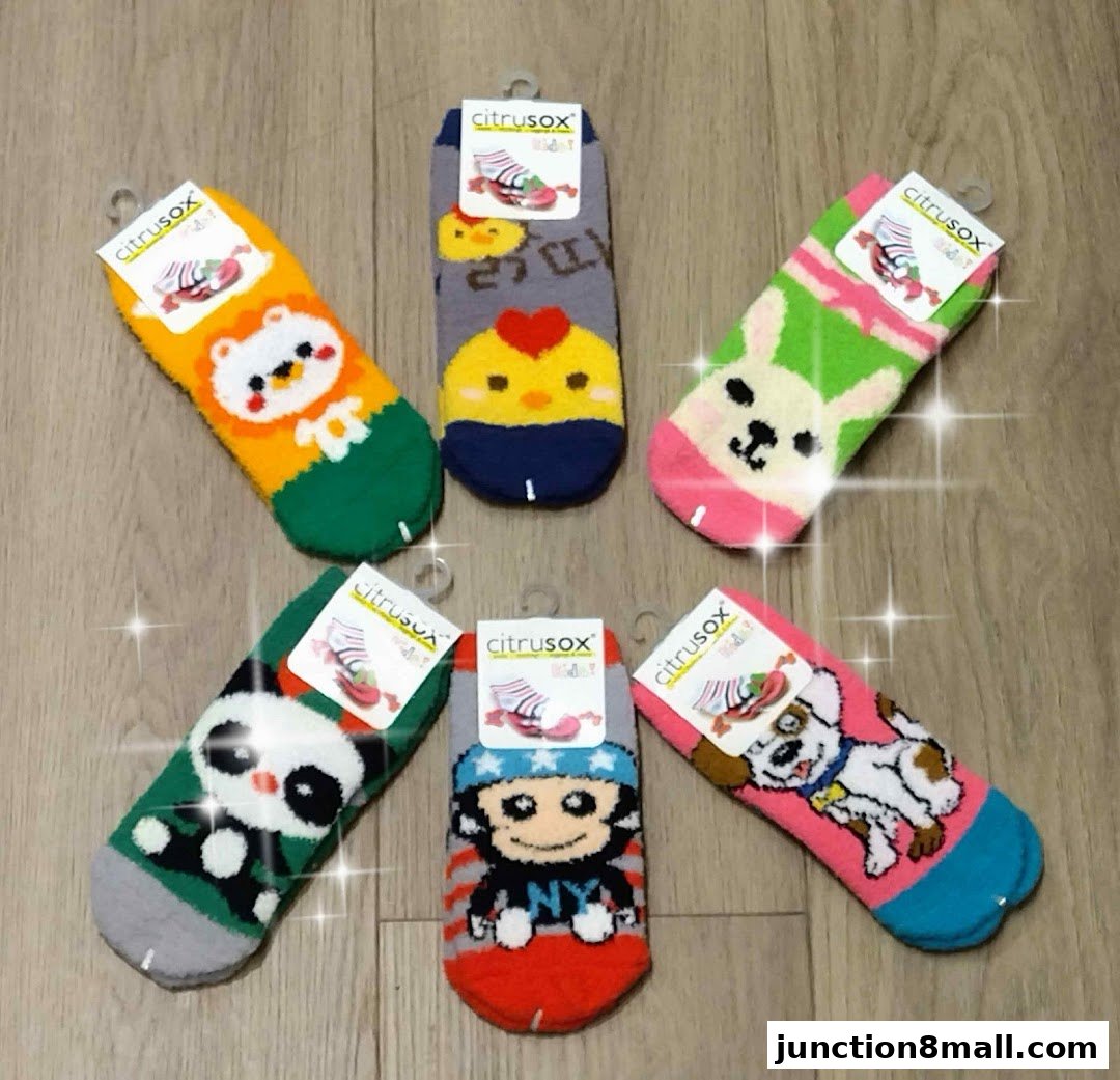 A collection of colorful children's socks with animal and character designs.