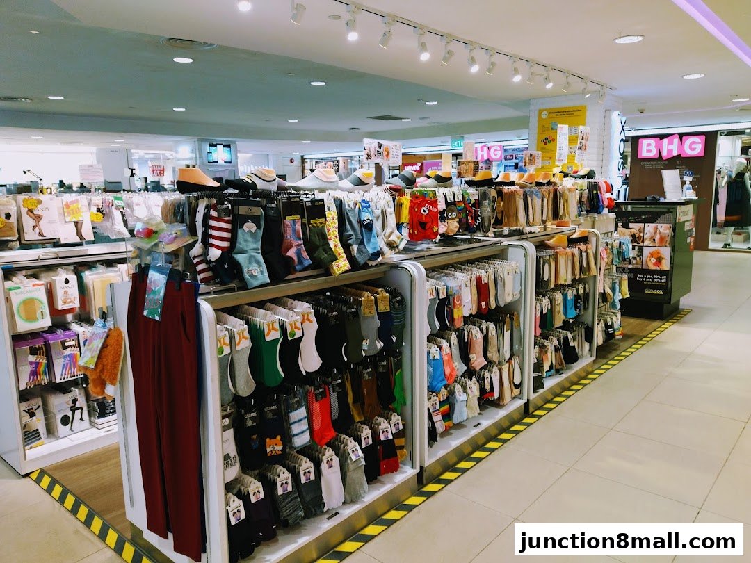 A wide selection of colorful socks and hosiery displayed on racks inside a retail store.
