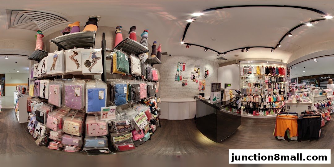 Interior view of a retail store showcasing a wide variety of socks and hosiery.