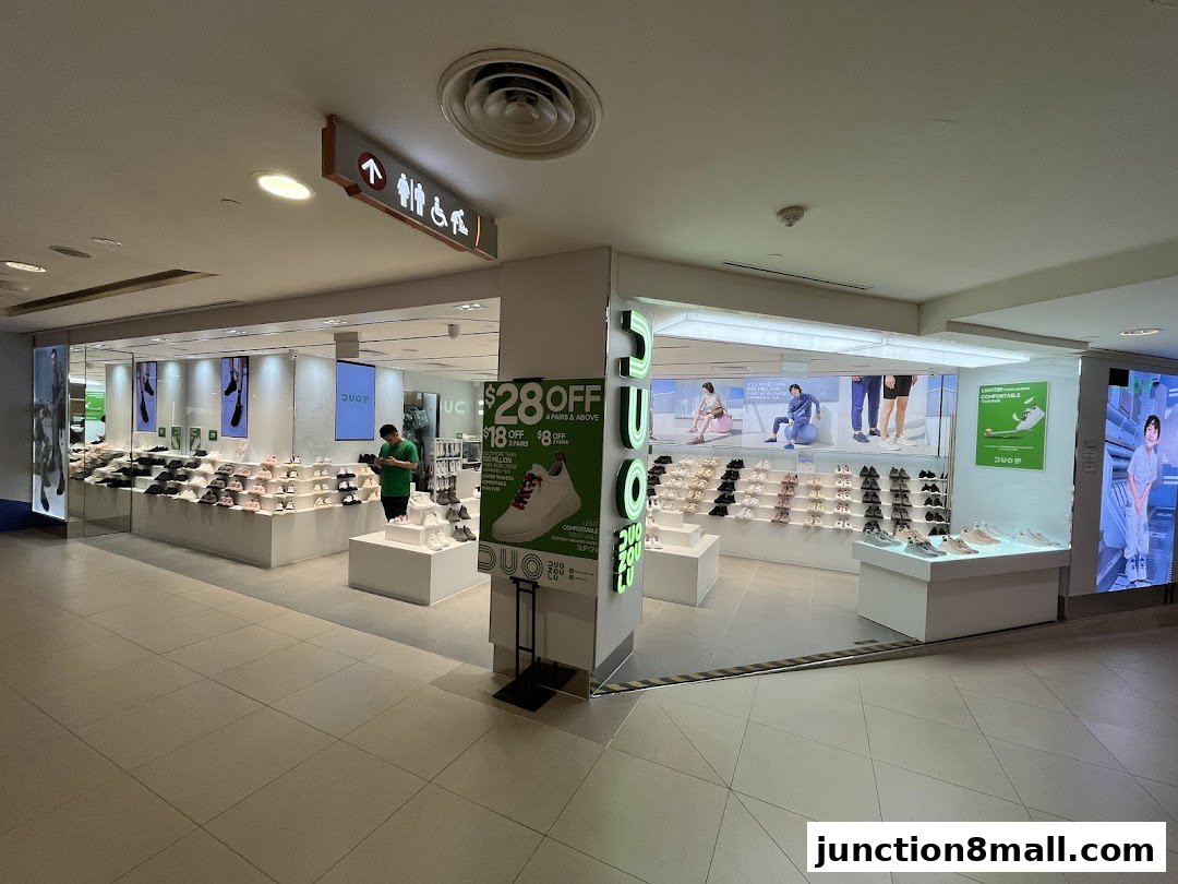 A well-lit shoe store with a wide selection of footwear displayed on shelves and stands.