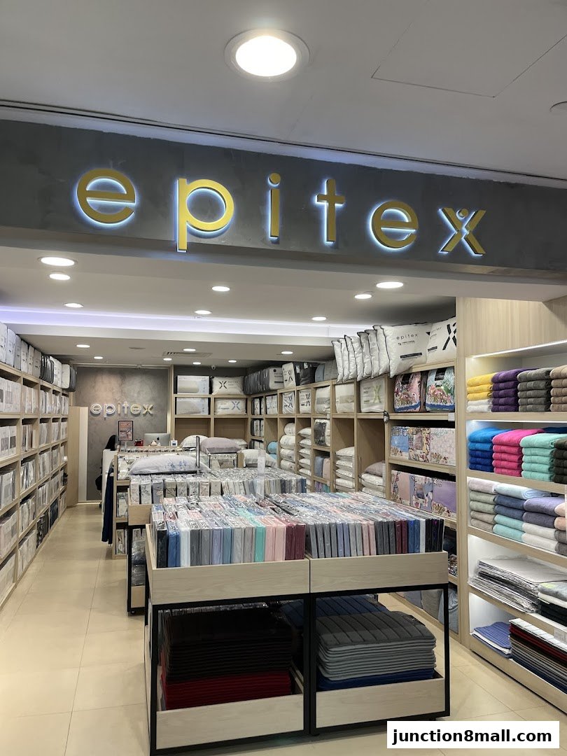 Interior view of Epitex Junction 8, showcasing a wide selection of bedding and towels.