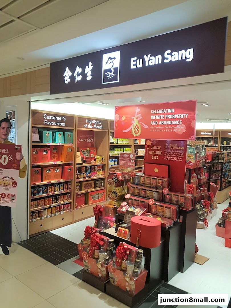 Eu Yan Sang store with festive displays of gift sets and products.
