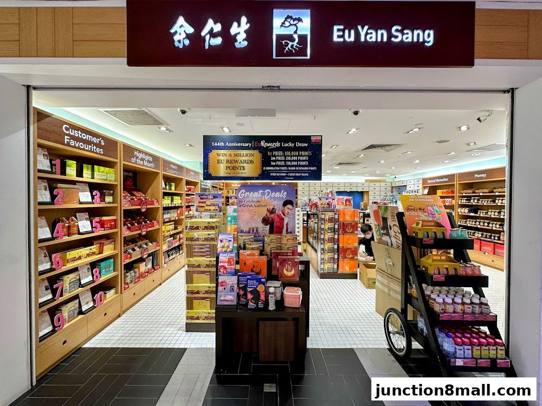 The entrance of Eu Yan Sang store, showcasing shelves of health products and promotions.