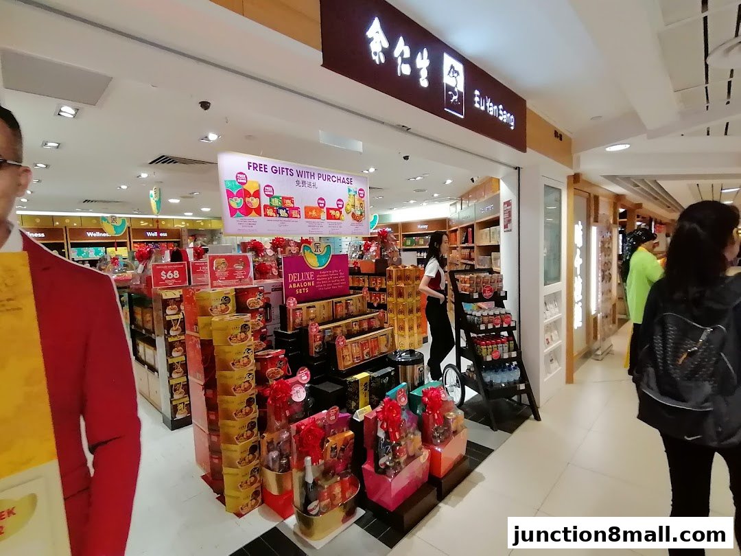 Eu Yan Sang store interior showcasing gift sets and promotional displays.