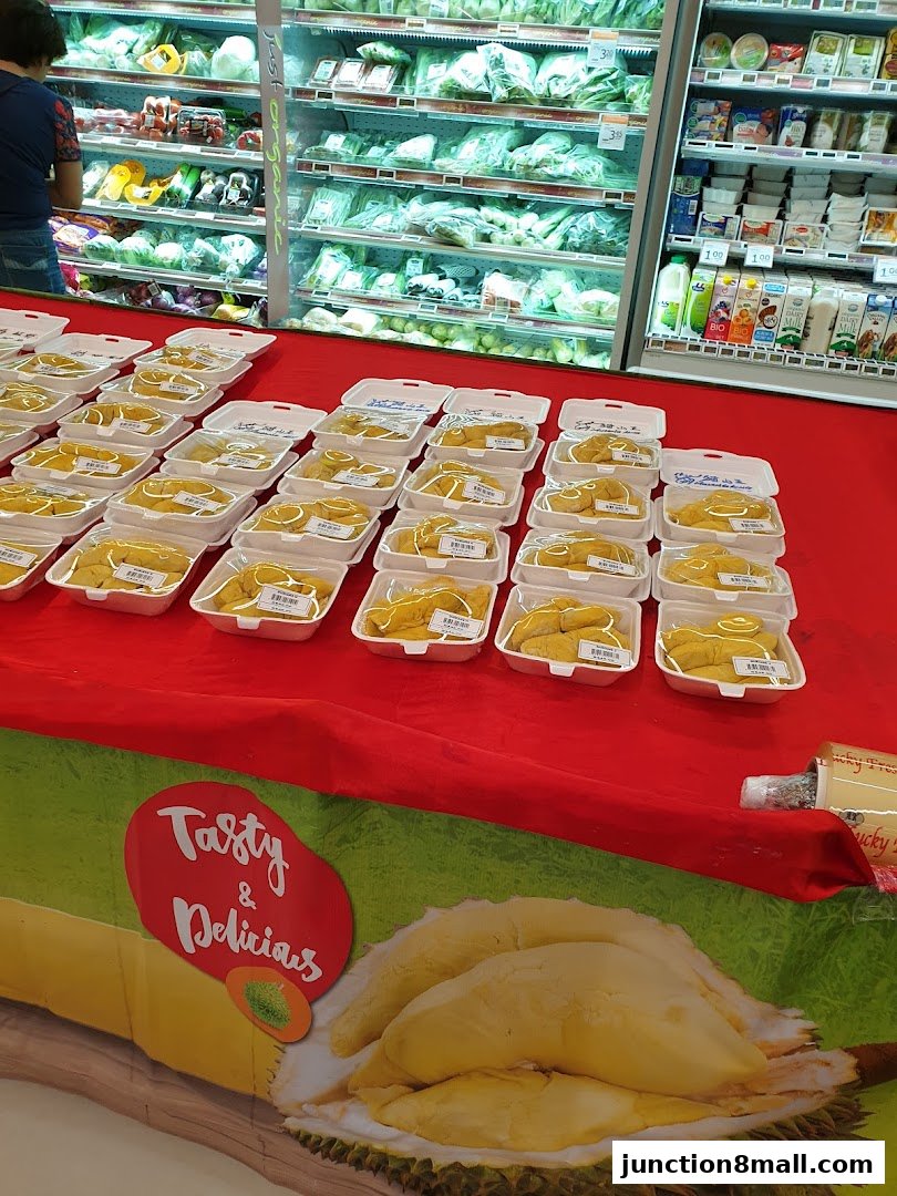 A display of pre-packaged durian fruit for sale at FairPrice Finest.