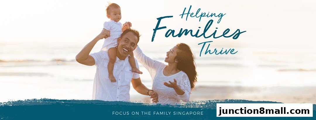 A happy family with a baby on shoulders on a beach, with text 'Helping Families Thrive'.