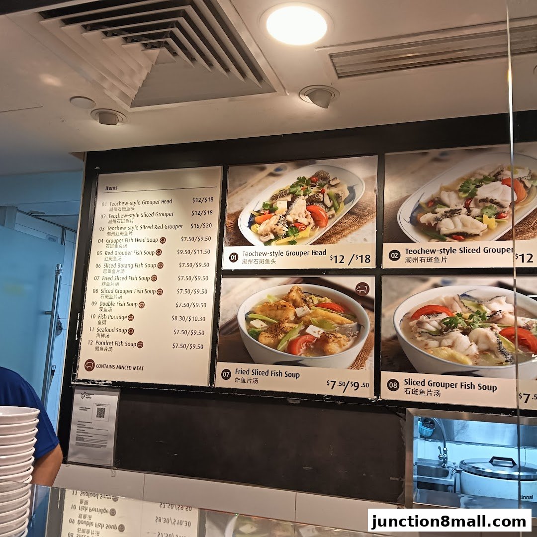 A menu board displaying various fish soup dishes with prices and accompanying images.